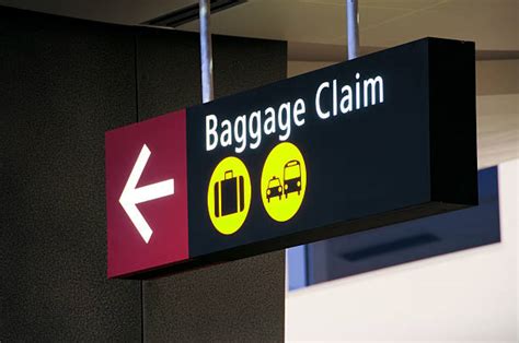 Best Baggage Claim Airport Arrow Sign Black Stock Photos, Pictures ...