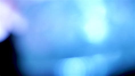 Blue light passes through glass glitter effect. Visual light leaks