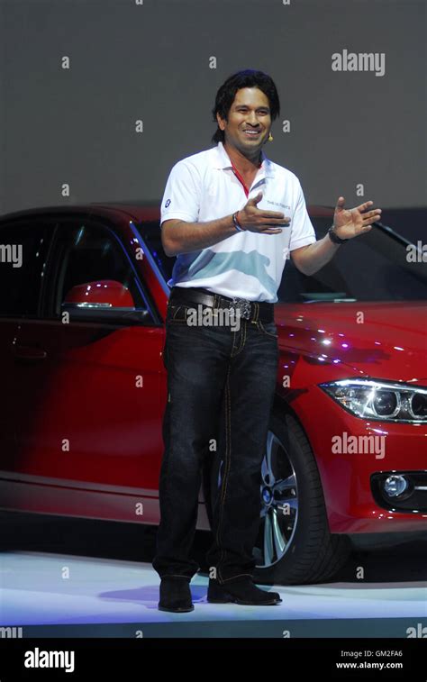 Indian Cricketer Sachin Tendulkar Poses With The New Bmw I Sportline