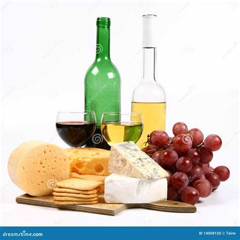 Various Types Of Cheese Wine Grapes And Crackers Stock Photo Image