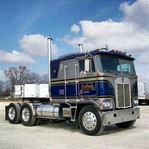 a large semi truck parked in a parking lot