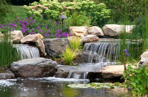 25 Gorgeous Pond Designs With Waterfalls To Inspire Your Backyard Oasis