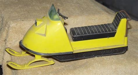 VINTAGE TOY SNOWMOBILE by picturesthenandnow on Etsy