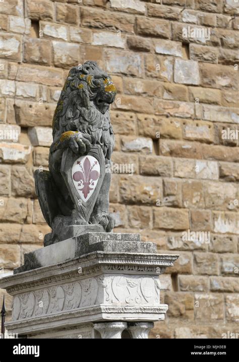 Statue Of A Great Panthera Leo Or Lion With Symbol Of Florence In Italy