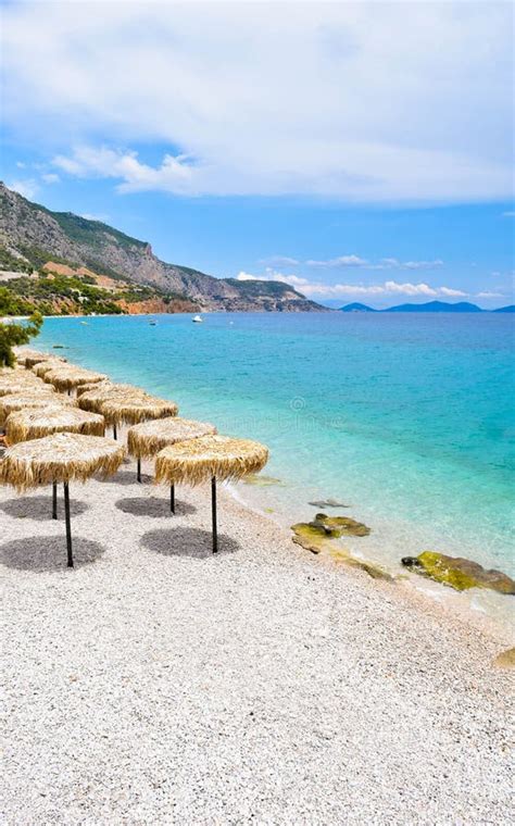 Beach of Kineta, Greece. stock image. Image of straw - 108409003