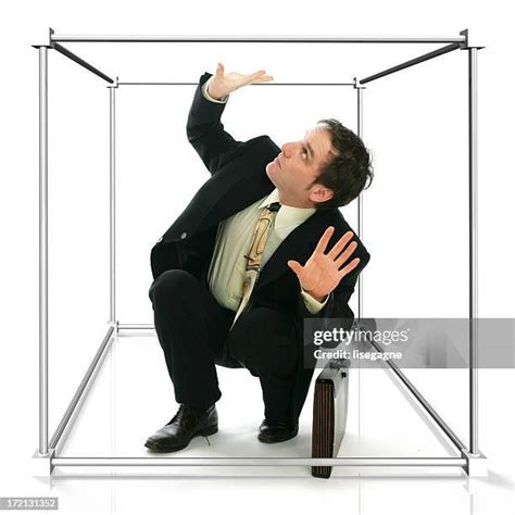 Man Squashed In Box Photos And Premium High Res Pictures Getty Images