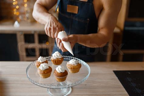 Nude Man In Apron Cooking Dessert On The Kitchen Stock Image Colourbox