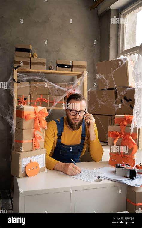sme halloween handsome young delivery man happy   order