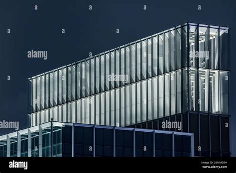 modern office building exterior at night Stock Photo - Alamy