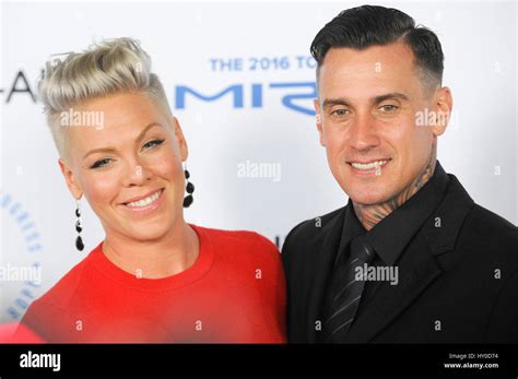 Singer Alecia Beth Moore aka Pink and husband Carey Hart arrive at ...