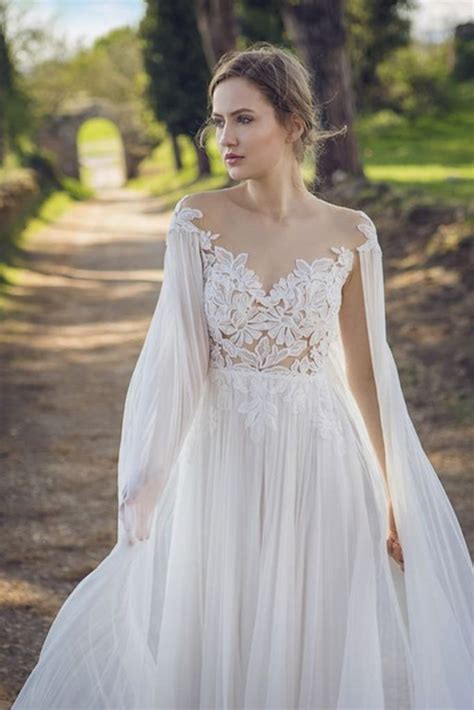 Los Vestidos De Novia Con Manga Capa Son Una De Las Tendencias