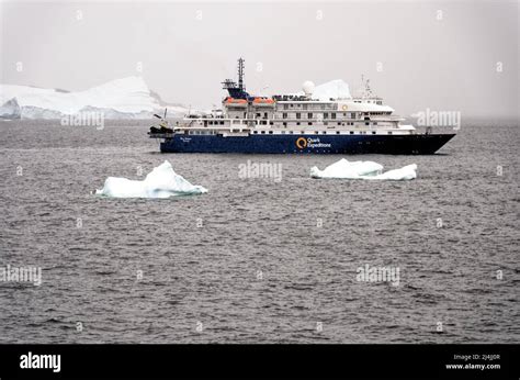 Exploring Antarctica - Quark Expeditions Sea Spirit Cruise Ship sailing among the Icebergs ...