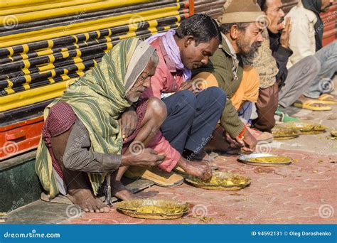 Poor Indian People Eating Free Food at the Street in Varanasi, India ...