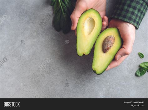 Hands Holding Avocado Image And Photo Free Trial Bigstock