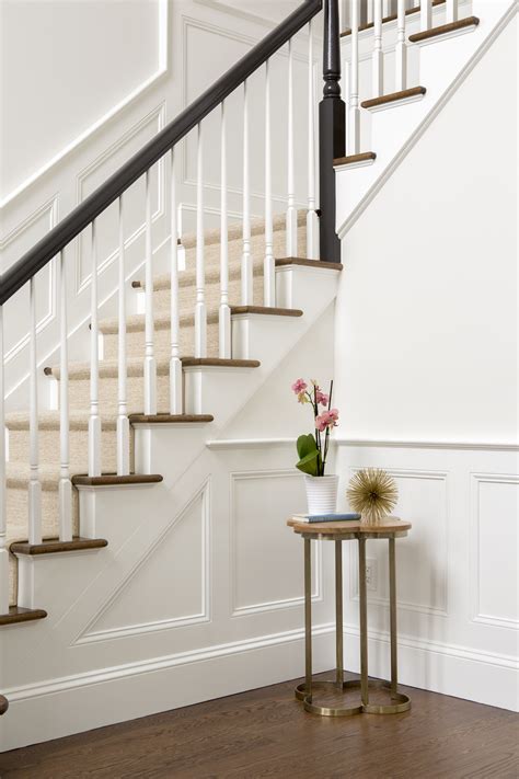 Beautiful Wainscotting And Newly Painted Stairway Bring Interest To