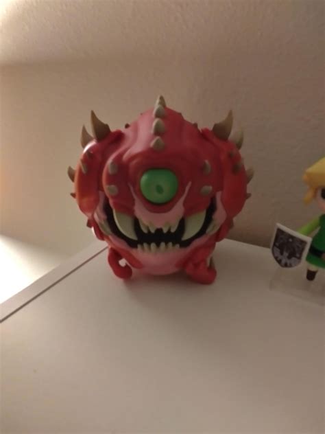 I traded in a couple of games for this cacodemon figurine and my dog ...