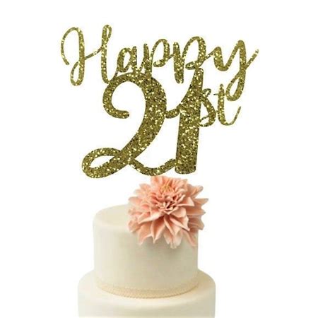 A Happy 21st Birthday Cake Topper With Gold Glitter And A Pink Flower On It