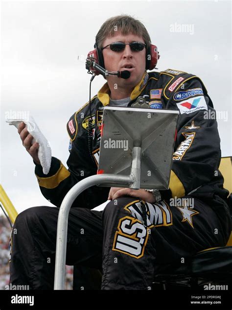 Crew chief of the US Army car Ryan Pemberton watches the action from the pit box at the Sylvania ...