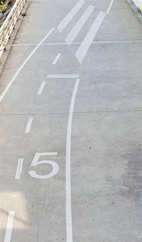 Bike Lane Marks And Pedestrian Crossing Symbol Ecological Motion Photo