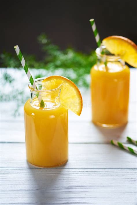 Fresh Orange Juice In The Mason Jar On Wood Table Stock Image Image