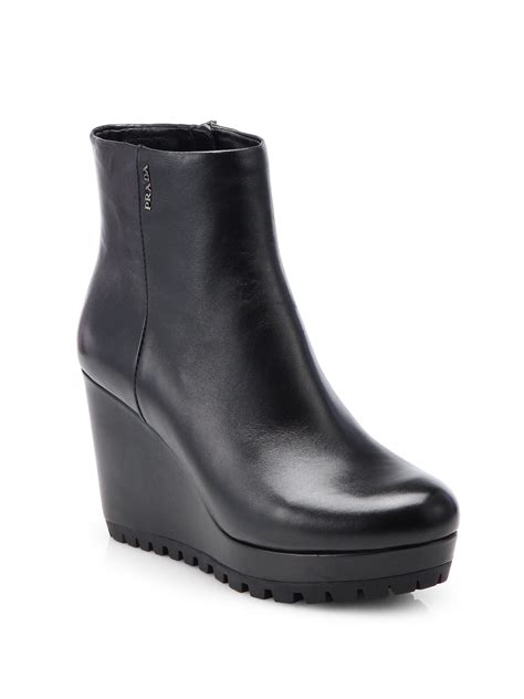 Prada Leather Wedge Ankle Boots In Black Lyst