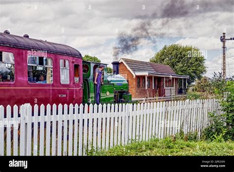 Steam train approaching railway station at Lincolnshire Wolds Railway ...