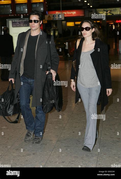 Brad Pitt And Angelina Jolie At Heathrow Airport Hi Res Stock