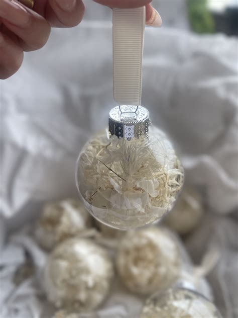 Wholesale Dried Flower Christmas Baubles Moss And Magnolia Fieldfolio