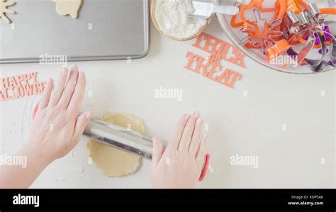 Step By Step Mother And Daughter Maaking Halloween Sugar Cookies Stock