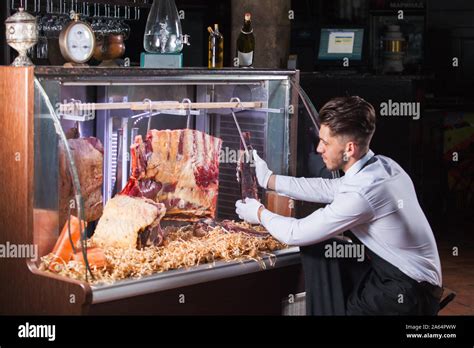 Display Of Dry Aged Meat Steaks In Butchers Shop Or Restaurant In An