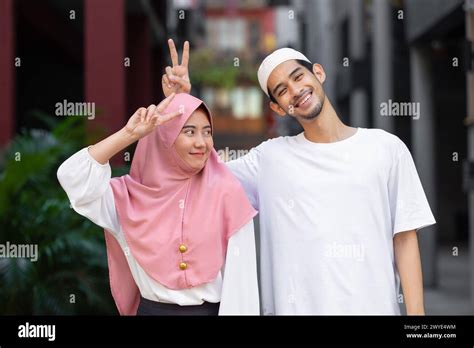 Portrait Happy Muslim Teen Man And Women Couple Lover Friend Standing