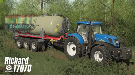 New Holland T7070 AC mit Suer 600 kg Gewicht Annaburger Güllefass mit