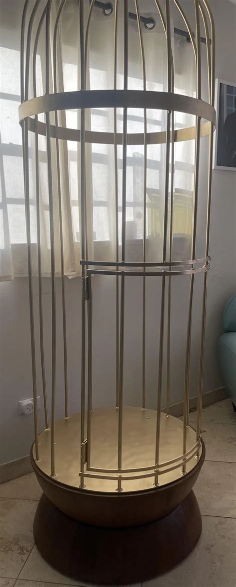 Pet got a new cage. Now master can show her off and keep her on display