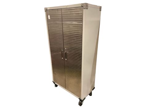 Lot - Rolling Metal Cabinet 72 x 36 x 18 in. (182.9 x 91.4 x 45.7 cm.)