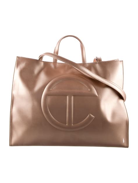 Telfar Large Shopping Tote Bag Gold Totes Handbags Wtelg26794 The Realreal