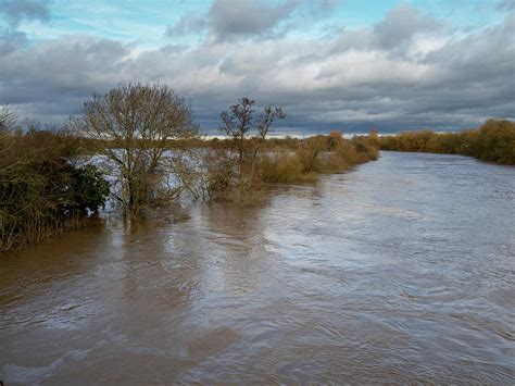 River Ouse in Flood Photograph by Angie C | Fine Art America