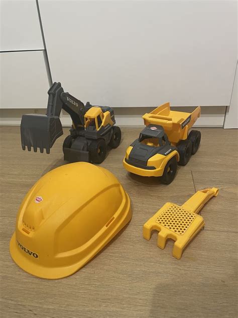 Dickie Toys construction Volvo zestaw koparka wywrotka kask łopatka