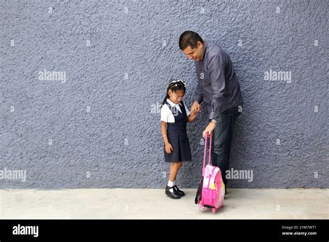 Divorced Single Dad Walks To School With His Year Old Brunette Daughter Carrying Her Backpack