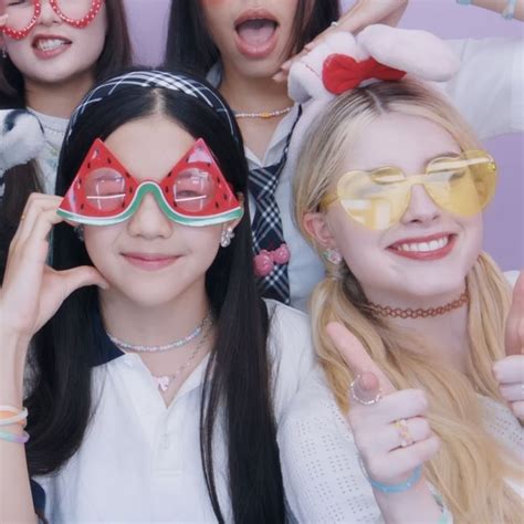 The Girls Are Posing For A Photo With Their Sunglasses On And One Girl