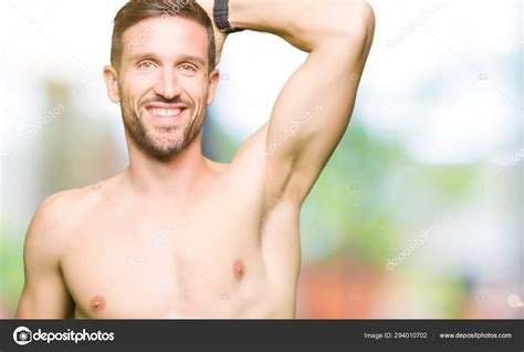 Handsome Shirtless Man Showing Nude Chest Smiling Confident Touching