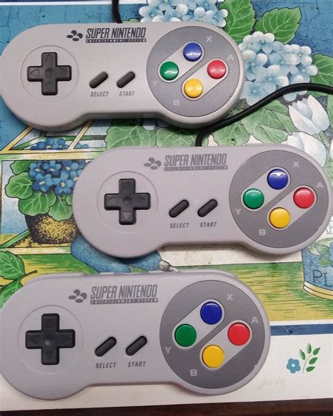 Nintendo Switch Wireless SNES controller vs OG SNES controller photo ...