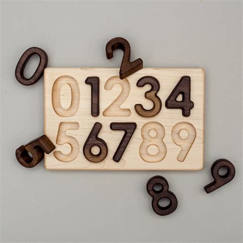 0 9 Wooden Number Puzzle Thispaperbook Wooden Numbers Wooden