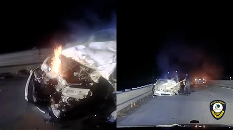 Watch Off Duty Officer Saves Woman From Burning Car Fox8 Wghp