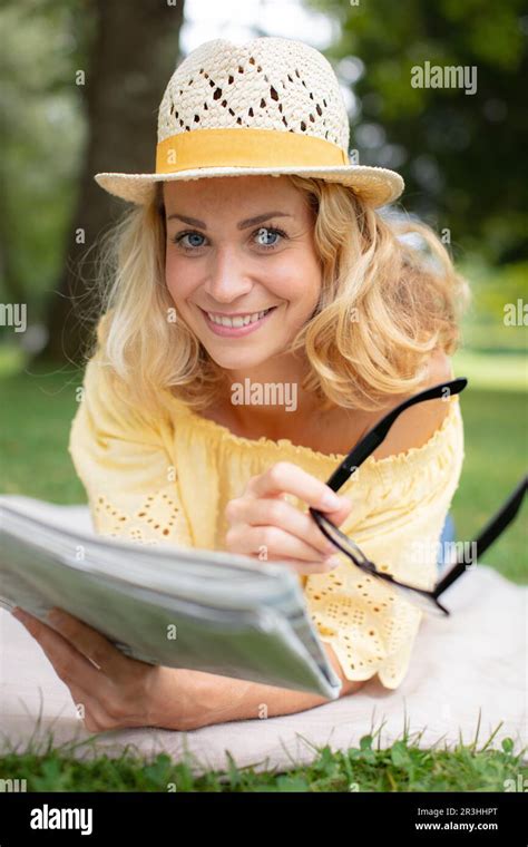 Blonde Girl Reading Newspaper Hi Res Stock Photography And Images Alamy