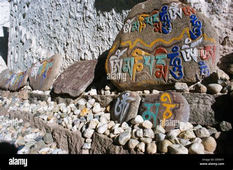 Mani Stones With The Buddhist Mantra Of Avalokiteshvara The Om Mani