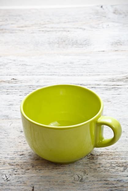 Premium Photo | Green coffee cup