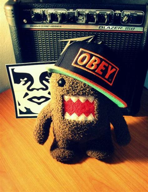 Domo And A Obeysnap Back Dinosaur Stuffed Animal Black And Red Obey