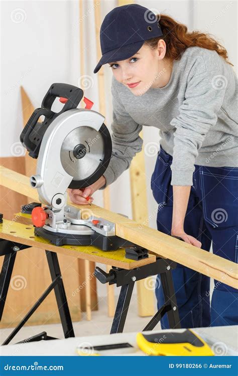 Woman Carpenter Using Circular Saw Selective Focus Depth Field Stock