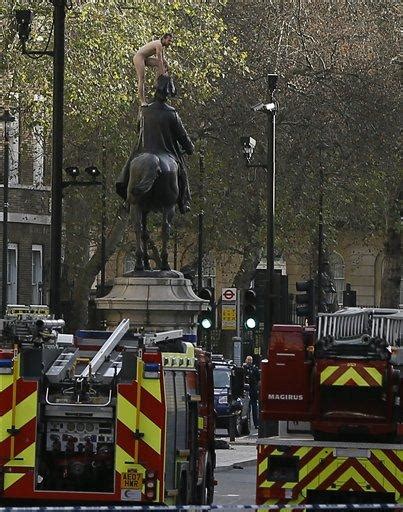 Naked Man Climbs Atop London Monument Strikes Precarious Poses