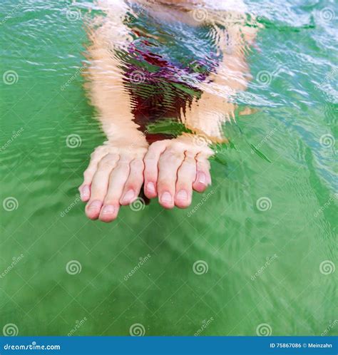 Detail Of Hands Swimming In The Ocean Stock Photo Image Of Surf